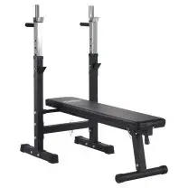 Mirafit M1 Folding Weight Bench with Dip Station in a home gym 