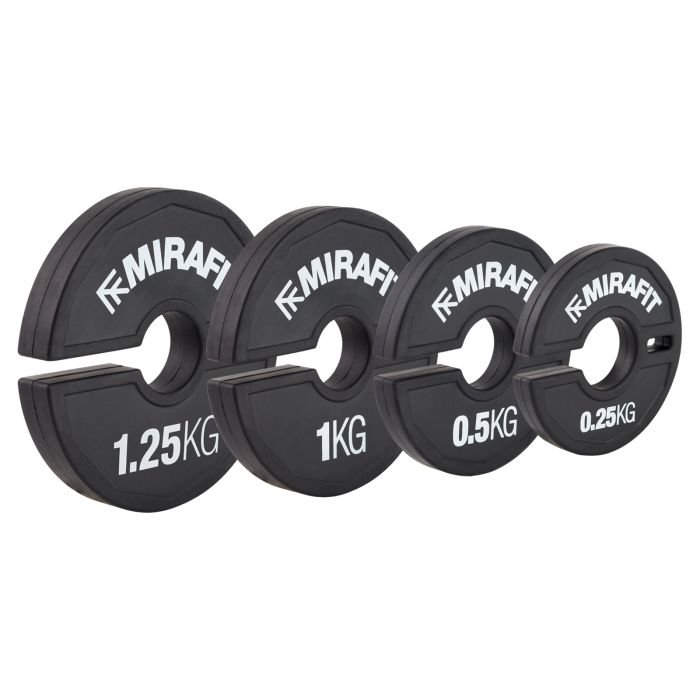 Full Set Mirafit Black Micro Change Plates on gym floor