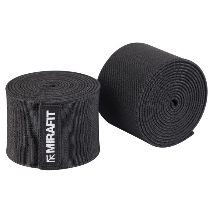 man attaching Mirafit Knee Wraps