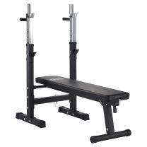 Mirafit M1 Folding Weight Bench with Dip Station in a home gym 