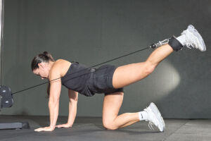 Donkey kick in a Mirafit Gym