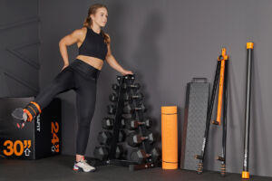 Woman exercising in her home gym