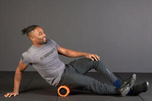 foam rolling glutes with Mirafit Deluxe Hi-Density Foam Roller