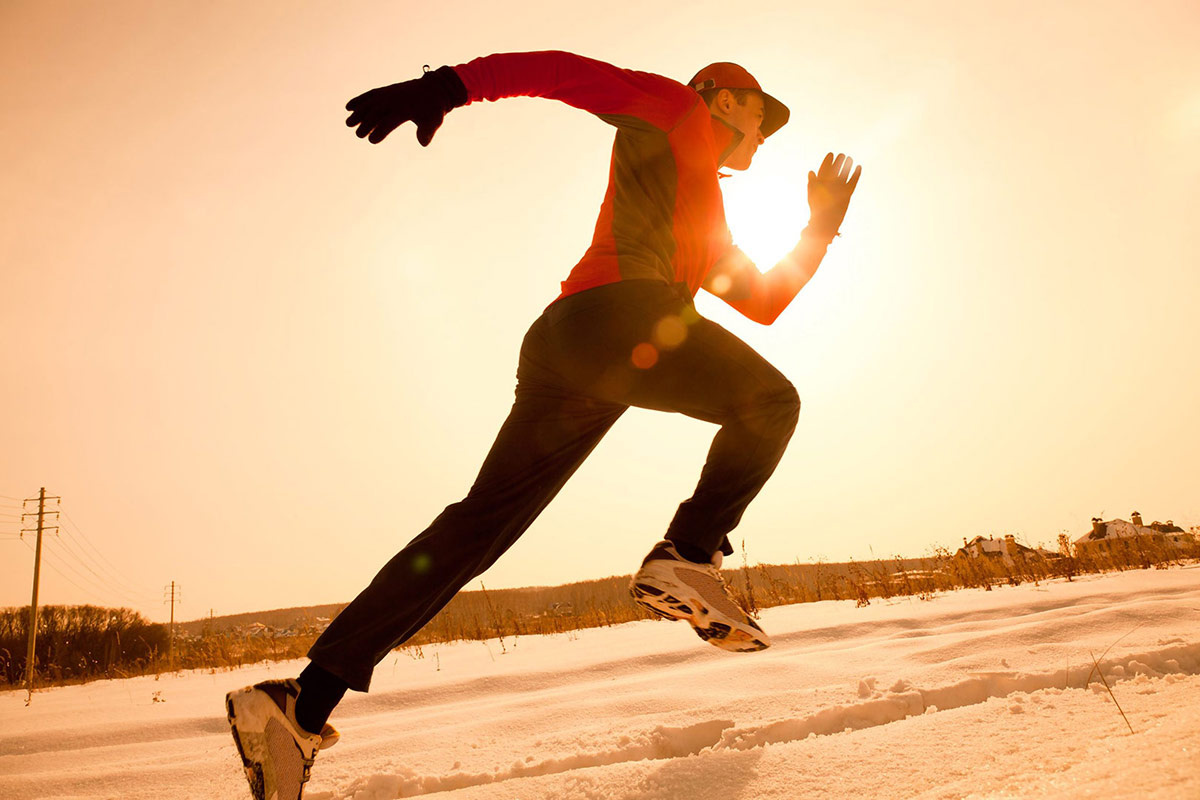 Person running outside in the snow