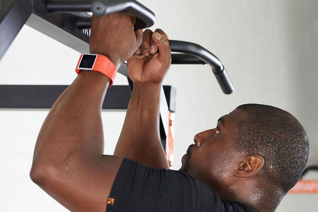 Man doing a neutral grip pull up on a Mirafit Power Rack