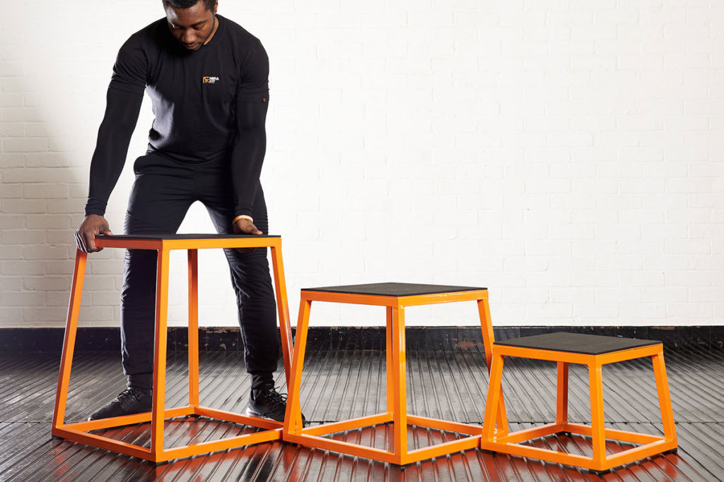 Man organising Mirafit Steel Plyo Jump Boxes
