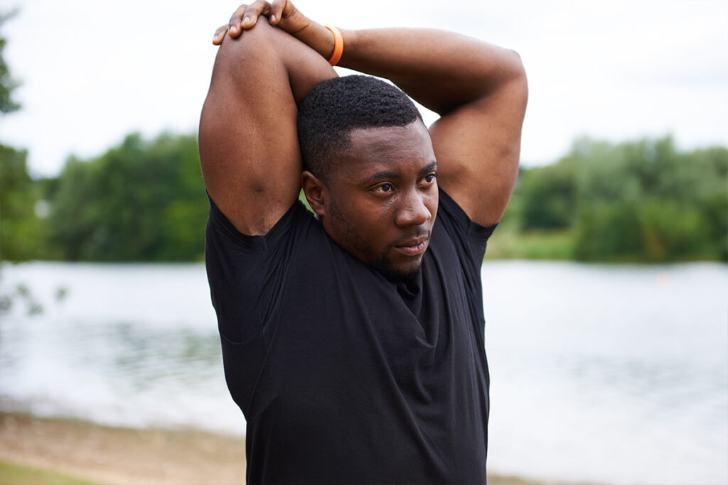 Don't forget to stretch Man stretching before a workout