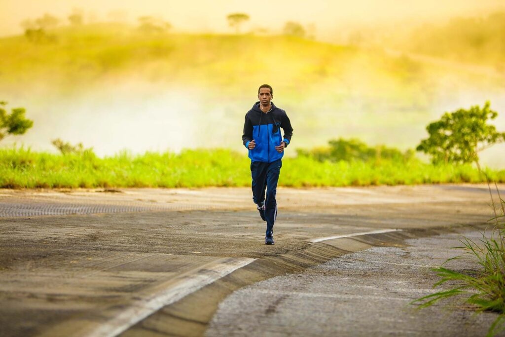 Man Running Along an Isolated Country Road
