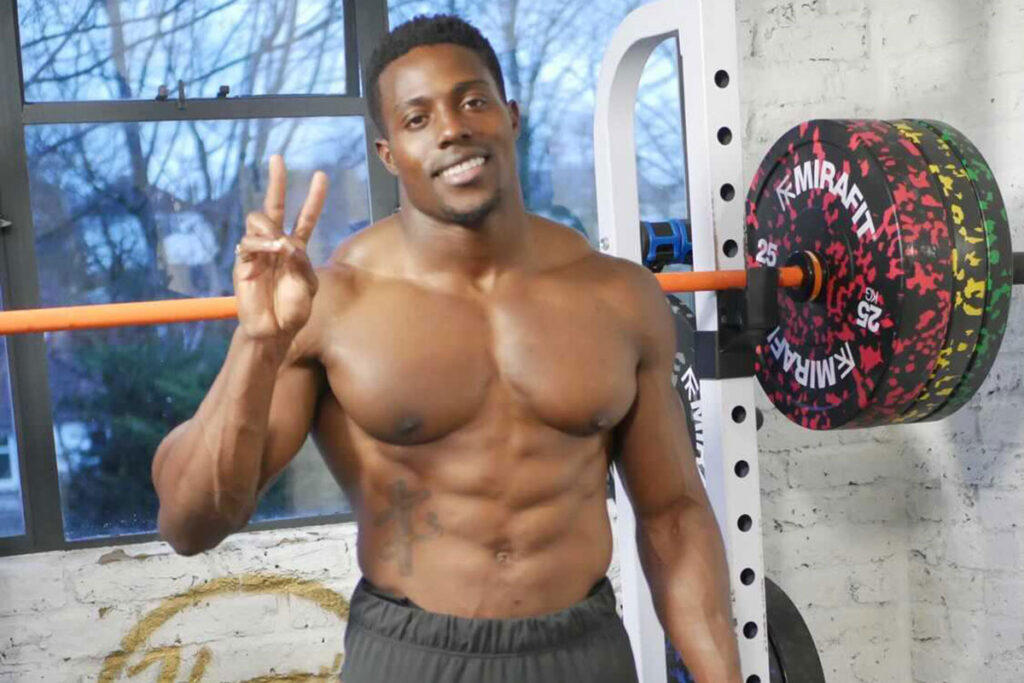 Harry AA Olympic sprinter Harry Aikines-Aryeetey poses in front of a set of Mirafit bumper plates