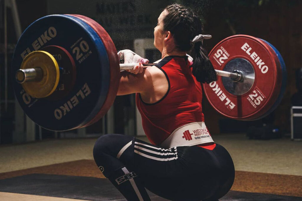Team GB Olympic Weightlifter Sarah Davies Cleaning the Bar - View from Behind
