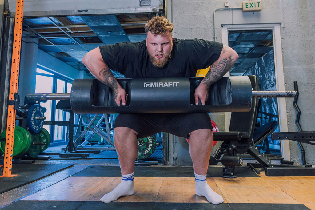 Mirafit Multi Grip 10" Strongman Log World's Strongest Man 2021 Tom Stoltman performing a log lift with a Mirafit strongman log