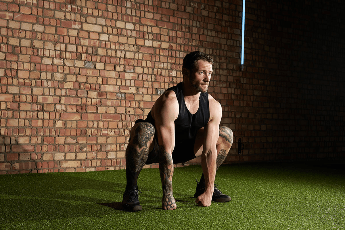 Gorilla stretch Gif of a man performing a gorilla stretch