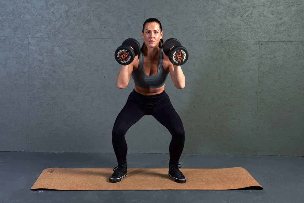 Mirafit Fitness Specialist Performing Dumbbell Thrusters with 7.5kg Dumbbells