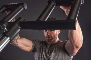 Man using a Mirafit Viking Press Landmine Bar Attachment