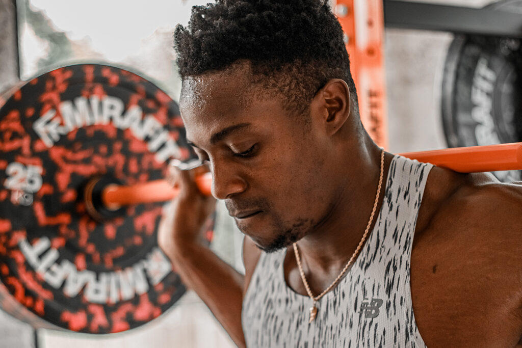 Mirafit Colour Splash Bumper Plates - 25kg Weight Plates Olympic sprinter Harry AA with Mirafit 25kg weight plates
