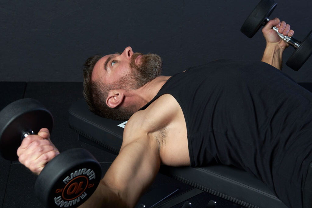 Man Performing Dumbbell Chest Flys  with Mirafit Dumbbells