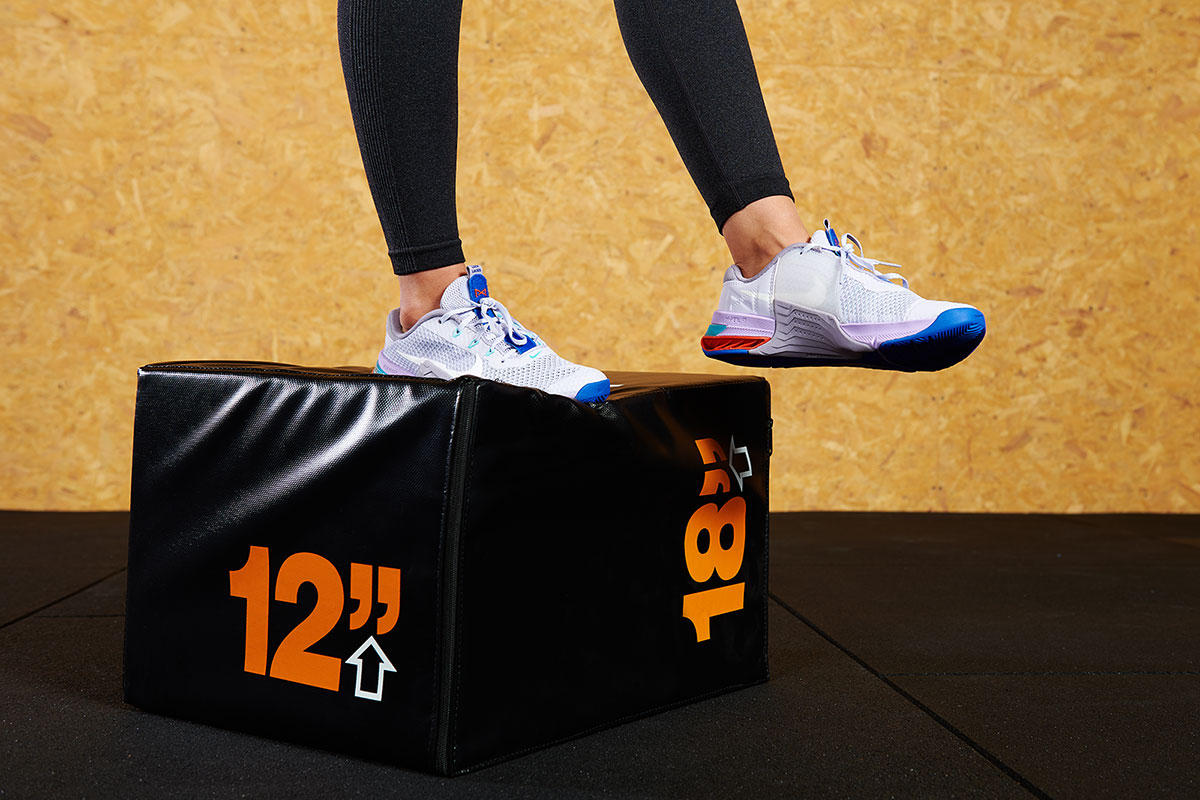 Drop landing Woman doing a drop landing with Mirafit 3in1 Soft Plyo Jump Box