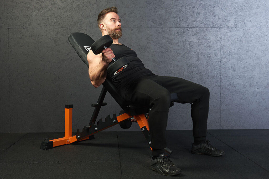 Mirafit Rubber Dumbbell Set Fitness Professional Doing Seated Unilateral Incline Dumbbell Curls with Mirafit dumbbells