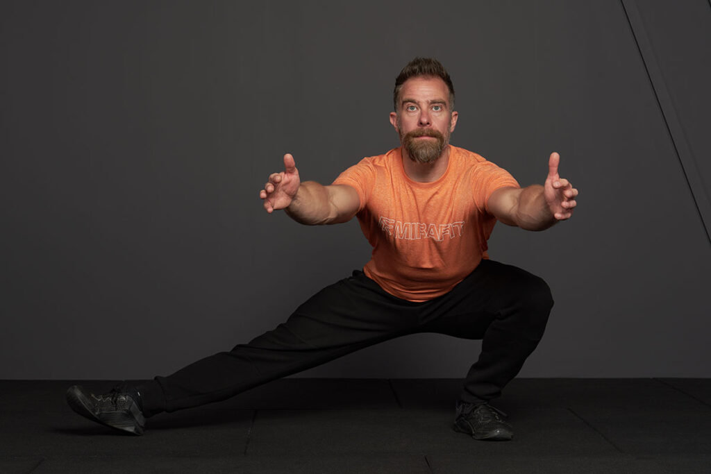 Man doing a Cossack Squat