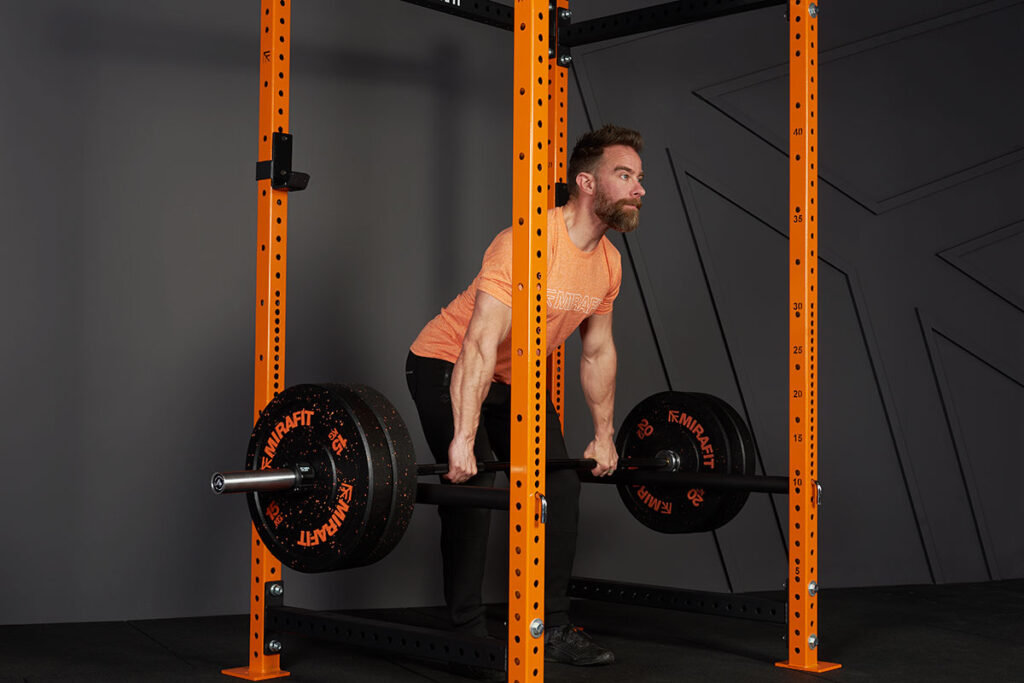 Rack Pull Man doing a rack pull in a Mirafit M3 Power Rack