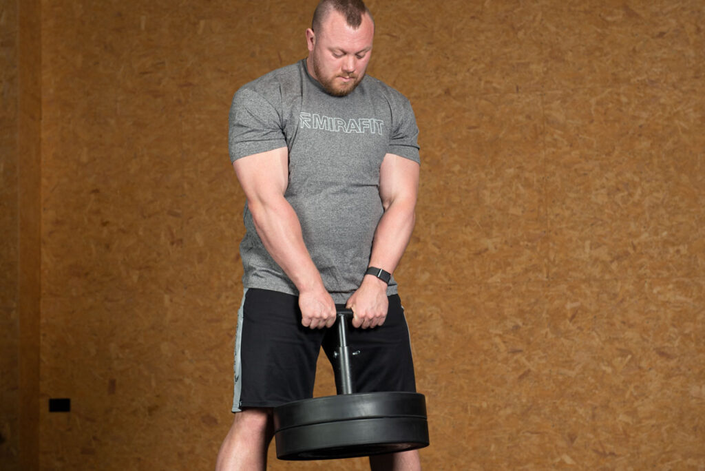 Mirafit Olympic Plate Loading Pin T Handle Adam Bishop using a Mirafit T Loading Pin to lift bumper plates