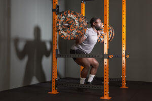 Man exercising in a Mirafit M3 Power Rack
