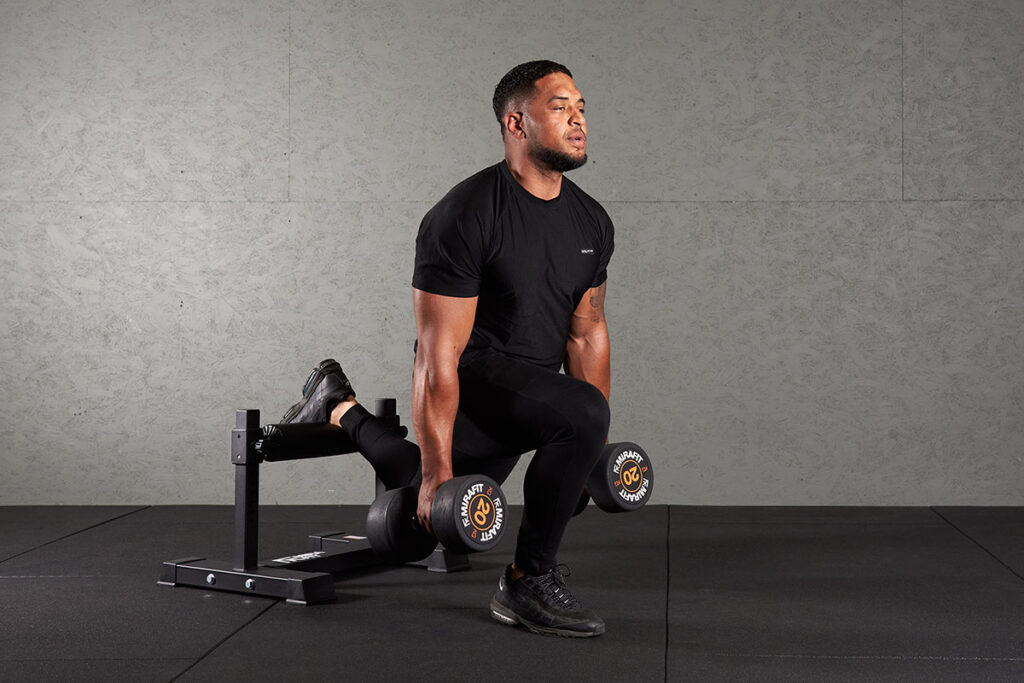 Man Doing Bulgarian Split Squats with Mirafit 20kg Dumbbells