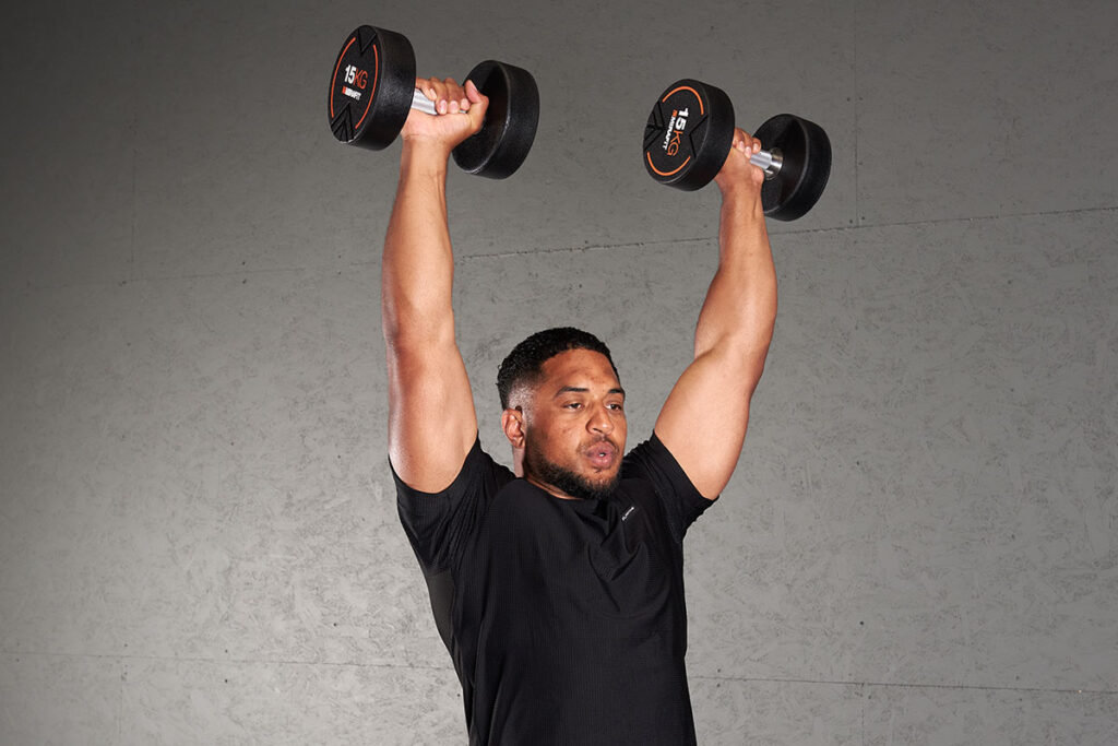Man Doing Dumbbell Thrusters with Mirafit 15kg Dumbbells