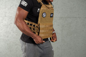 Man working out wearing a Mirafit Tactical Weight Vest