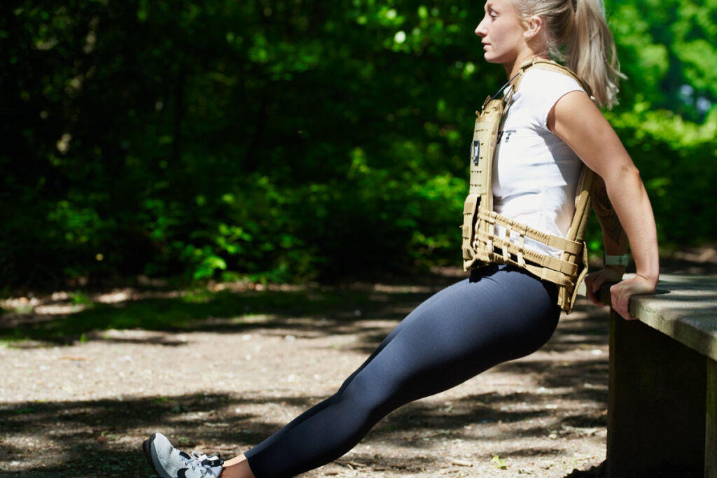 Dips Woman doing dips in a Mirafit Tactical Weight Vest