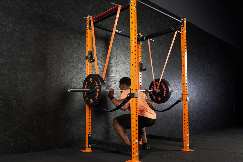 Resistance Band Assisted Barbell Squat with Mirafit Resistance Band.