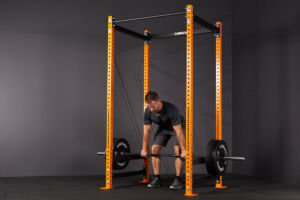 Man deadlifting in a Mirafit Power Rack