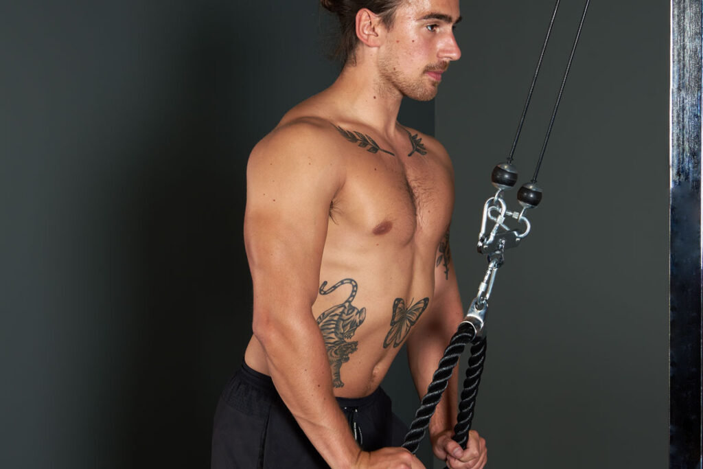 Tricep extension using Mirafit Wall or Rack Mounted Cable Pulley Machine