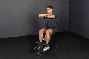 Man using a Mirafit Sissy Squat Bench