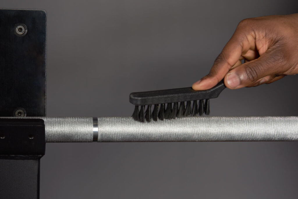 Man cleaning his Mirafit barbell