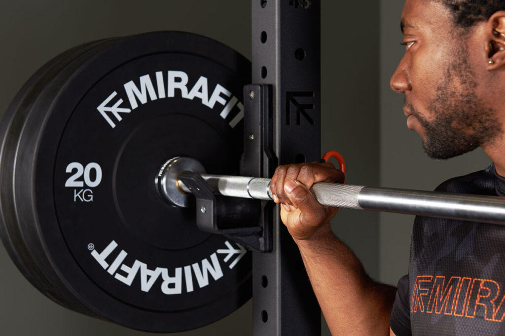 Mirafit M4 Roller J-Cups Man using Mirafit M4 Roller J-Cups