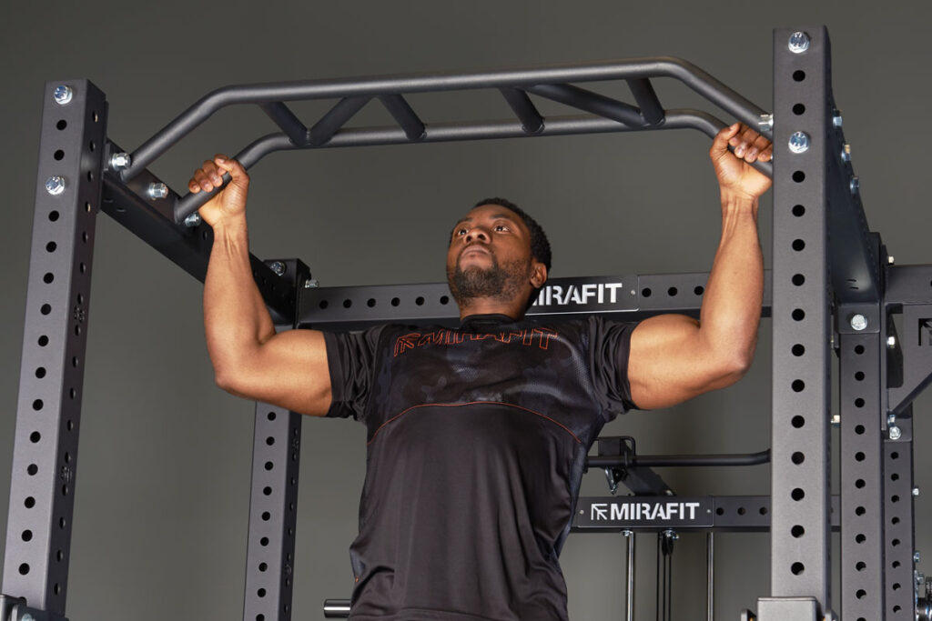 Mirafit M4 Multi Grip Pull Up Bar Man using Mirafit Multi Grip Pull Up Bar