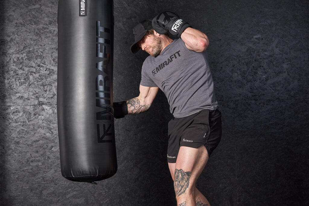Rear uppercut on Mirafit hanging punch bag
