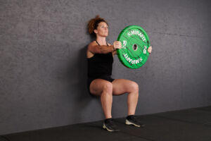 Wall Sit Forward Plate Hold with Mirafit Marbled Bumper Plate