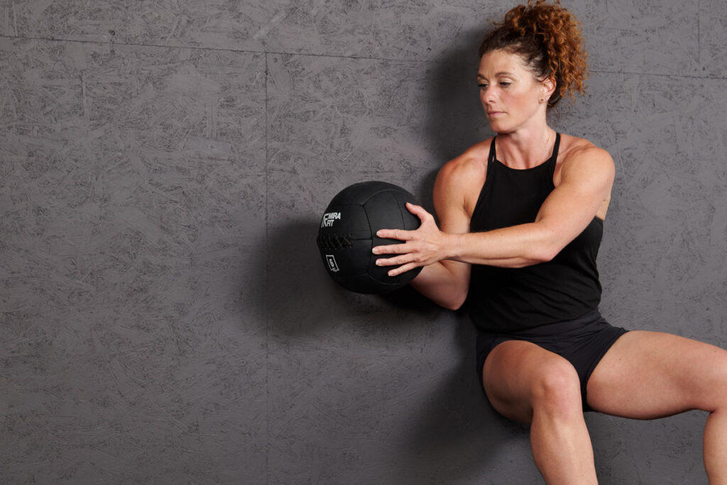 Wall Sit with Rotation using Mirafit Mini Wall Ball