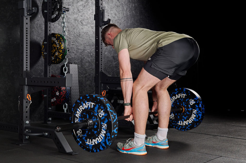Romanian deadlift using Mirafit colour splash bumper plates
