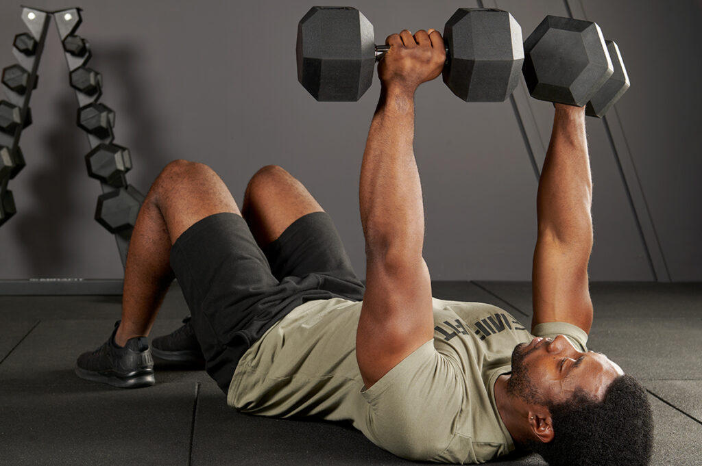Dumbbell floor press using Mirafit Hex Dumbbells