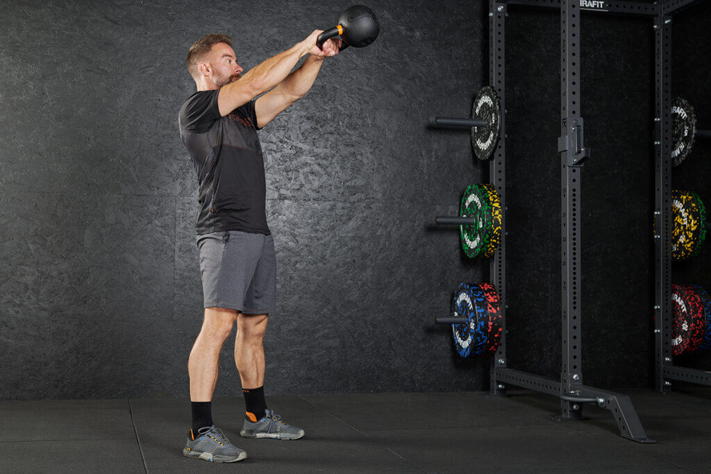 Kettlebell Swing Kettlebell Swing (a functional kettlebell exercise) with a Mirafit Cast Iron Kettlebell