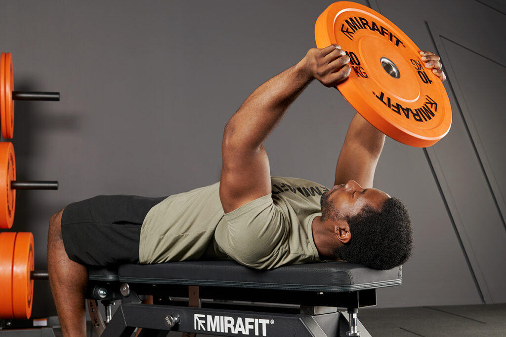Lying tricep extension using Mirafit Olympic Bumper Plate