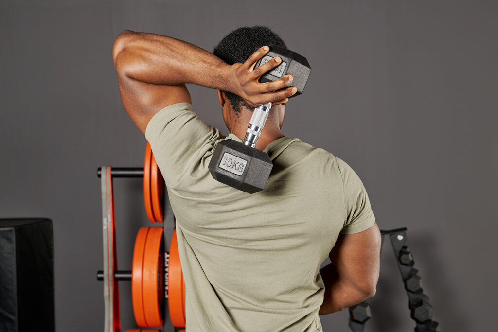 Overhead triceps extensions with Mirafit Hex Dumbbell
