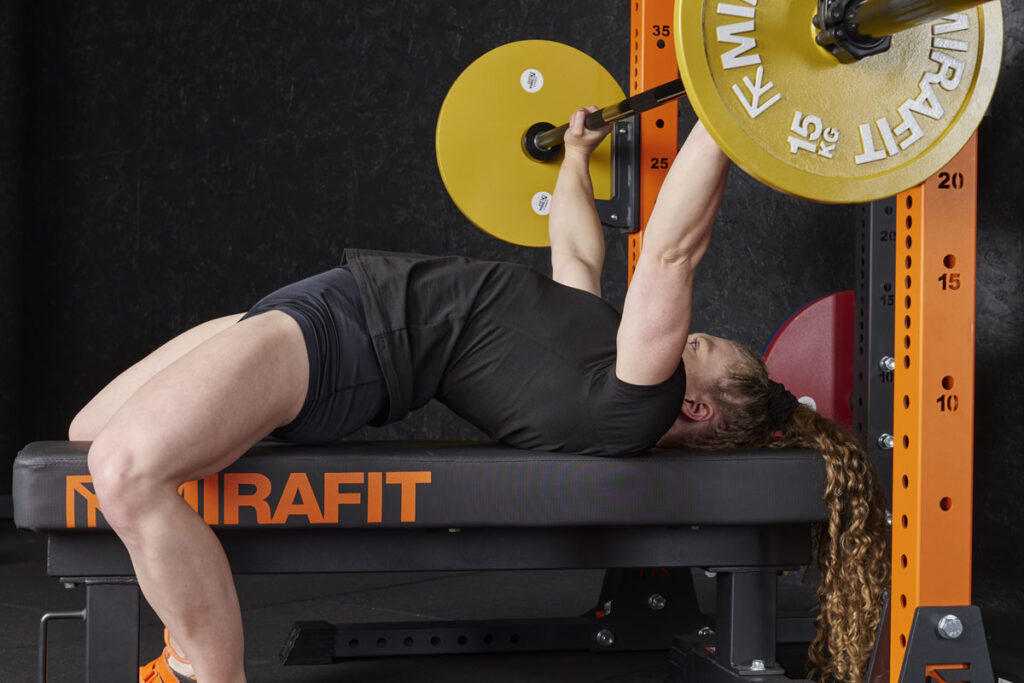 Bobbie Butters Spoto bench press with Mirafit Weight Plates