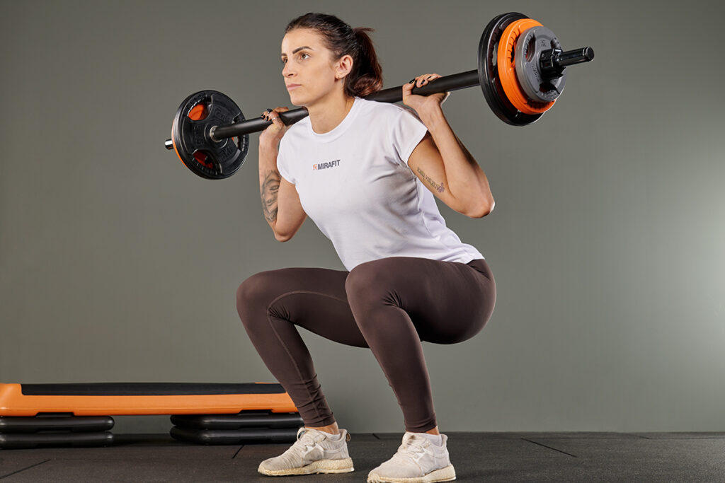 Back squat using Mirafit Studio Pump Set