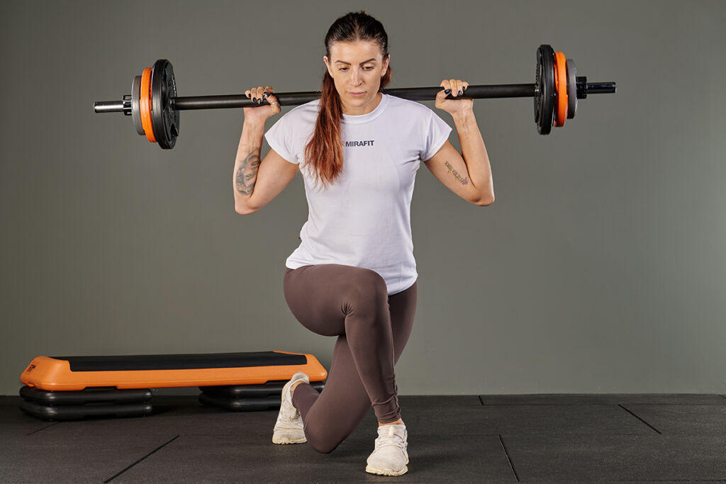 Curtsy Lunge using a Mirafit Studio Pump Set