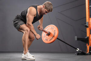 Meadows Row using Mirafit Olympic Bumper Plates
