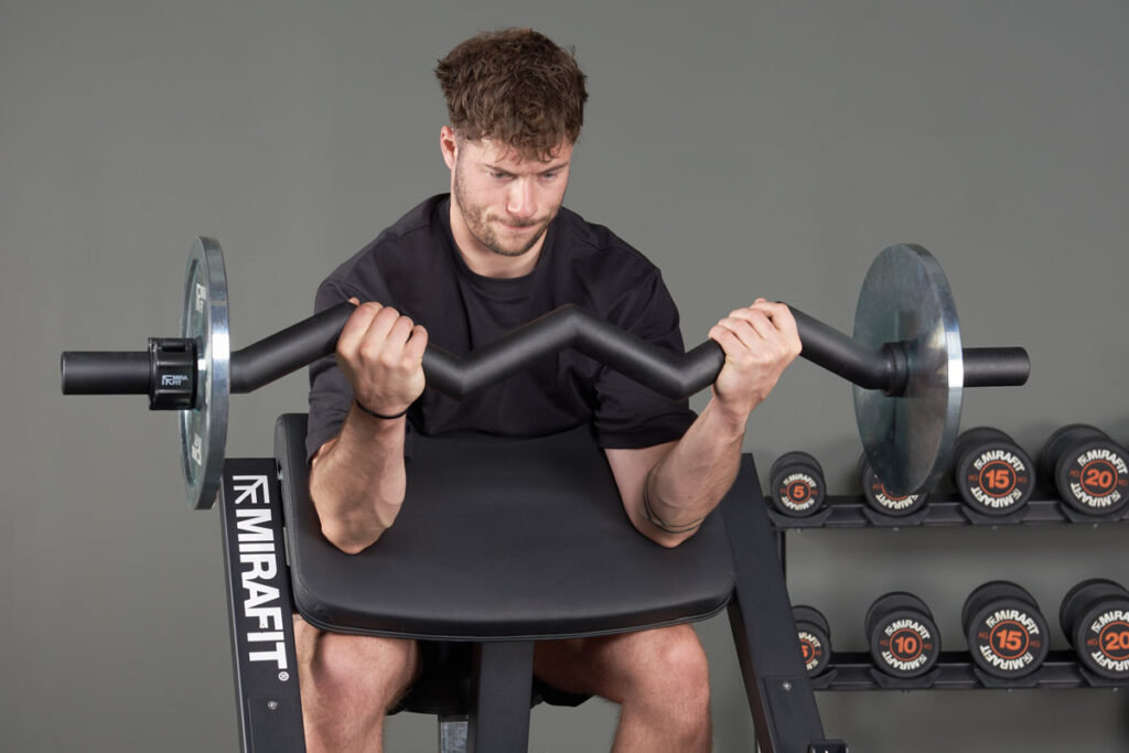 Preacher curl using a Mirafit EZ Axle bar